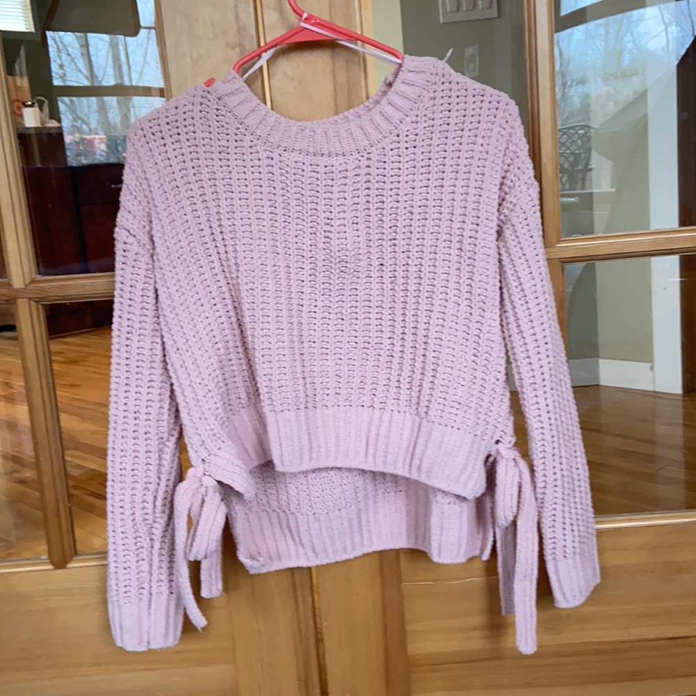 Pink crocheted sweater